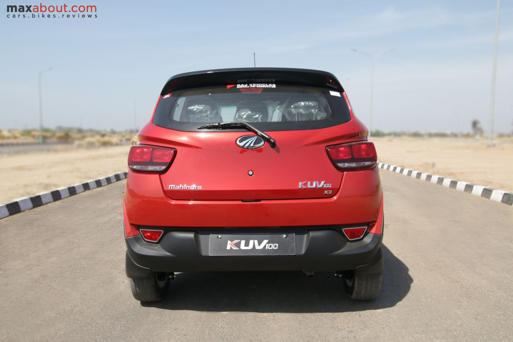 KUV's strong lines are clearly visible on the top of its taillights.