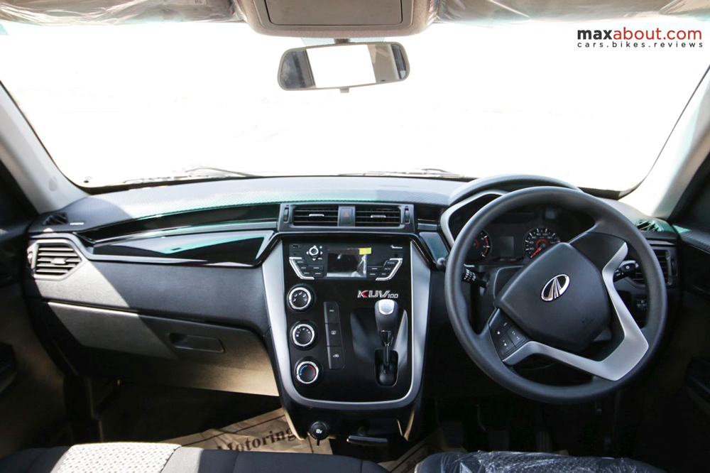A perfect mixture of faux carbon fiber, Piano Black and standard Black shade can be seen on its dashboard.