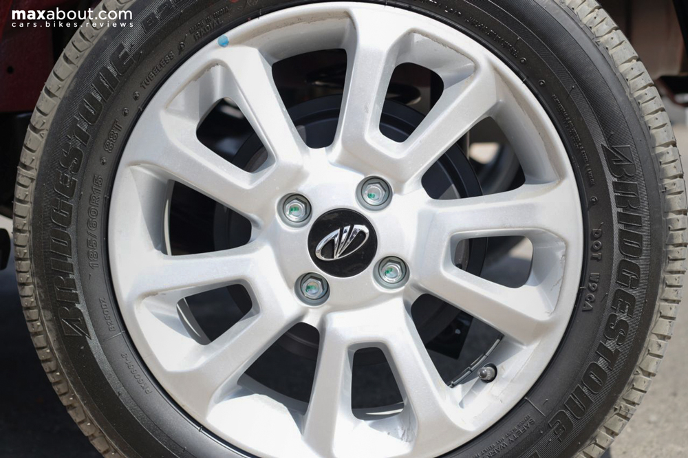 Top spec car comes with 15 inch alloy wheels with Black Mahindra logo in the middle.