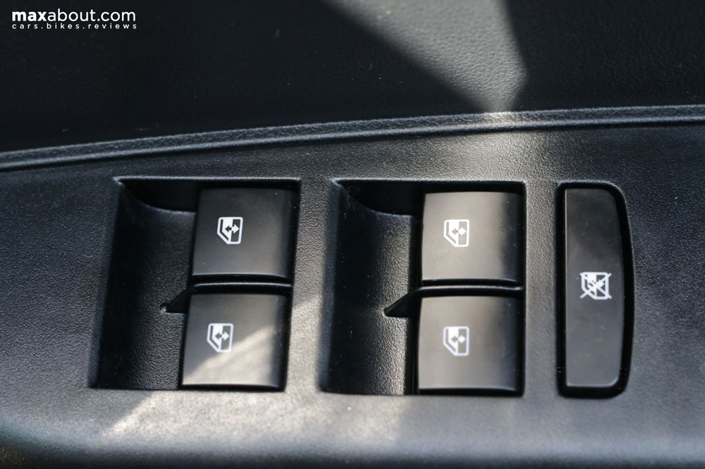 Driver side door panel holds all four power window switches and window lock switch.