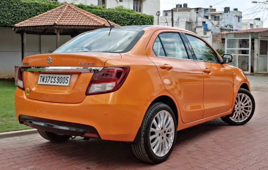 This Maruti Dzire Features Twin Sunroofs and White Leather Interior - midground