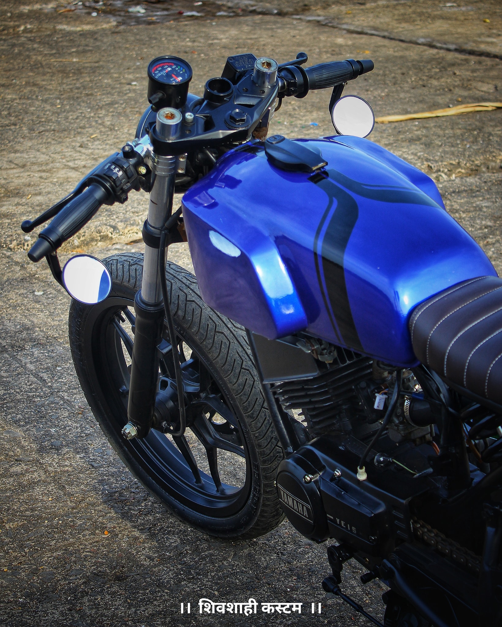 Perfectly Modified Yamaha RX135 Cafe Racer by Shivshahi Customs - background