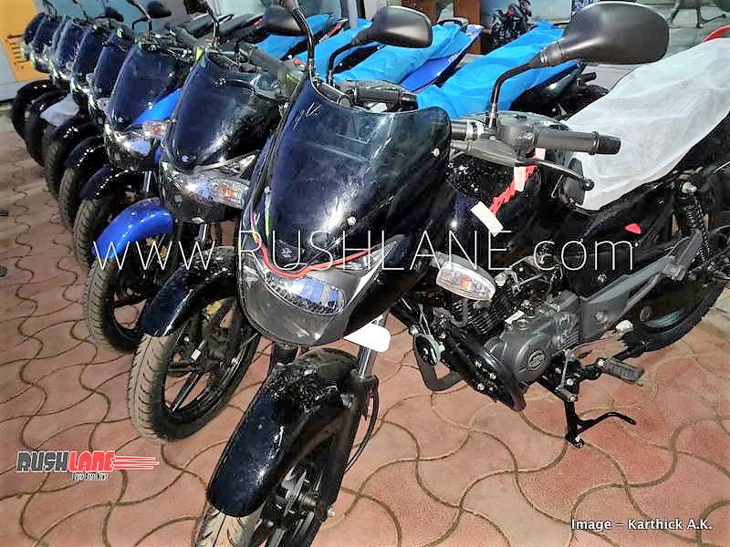 New Bajaj Pulsar 150 Variant Spotted at a Dealership Ahead of Launch - background