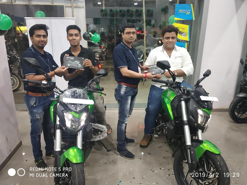 Customers Taking Delivery of Green Dominar