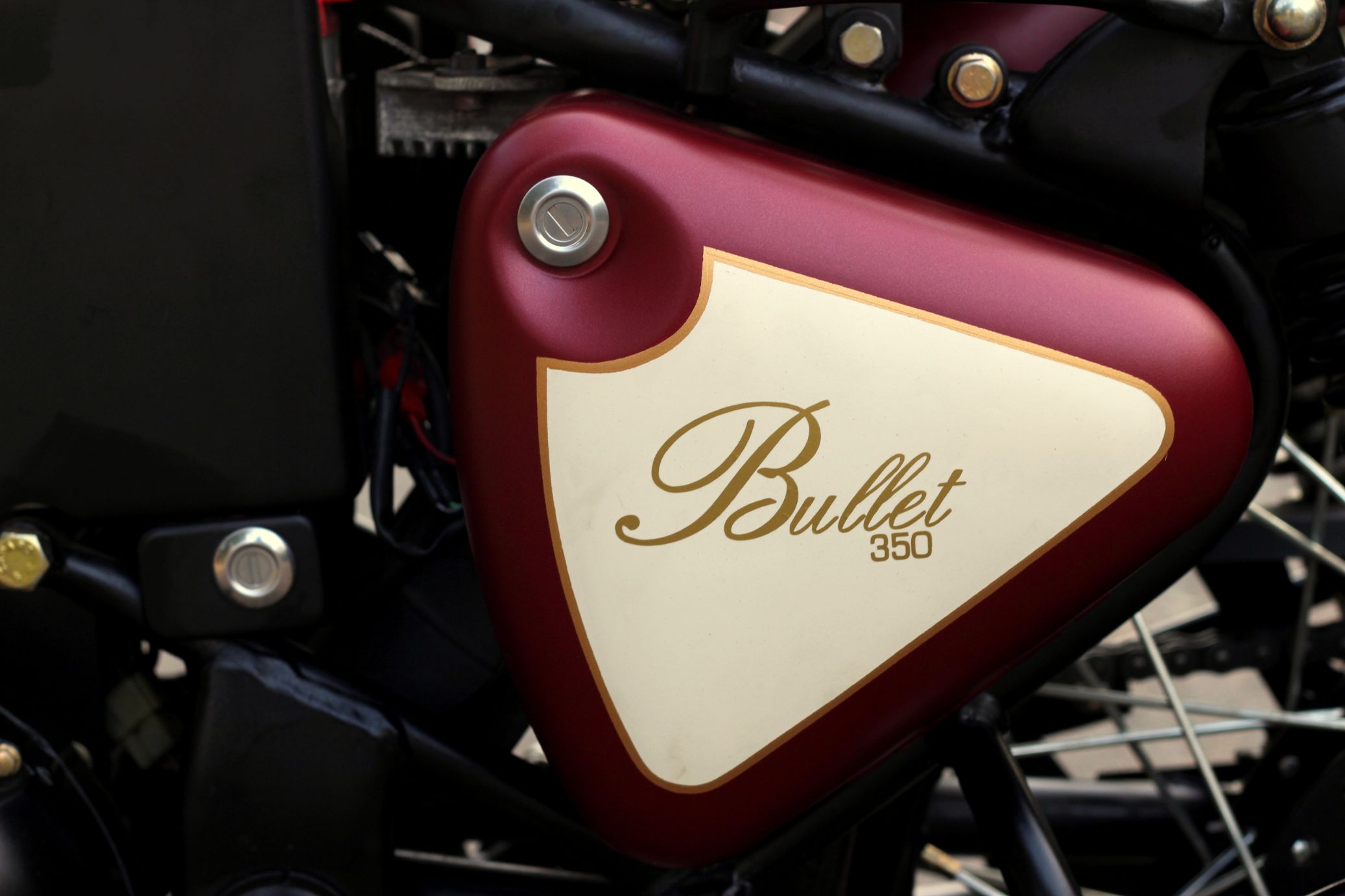 Meet Matte Maroon Royal Enfield Retro 350 by JEDI Customs - foreground